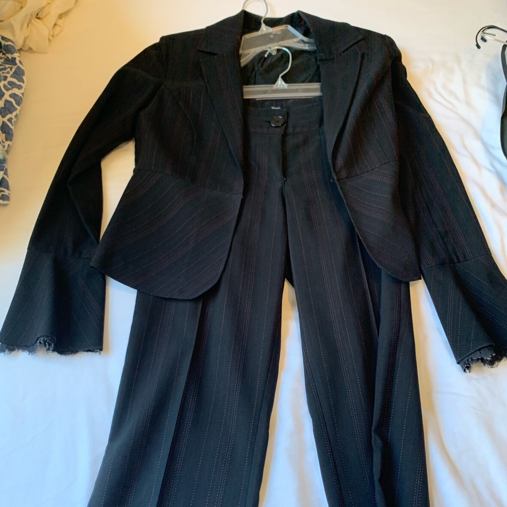 Pinstriped pantsuit.